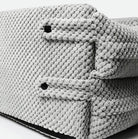 Graues Hundebett aus weichem, strukturiertem Stoff, ideal für Komfort und Stil. Perfekt für Haustiere, langlebig und pflegeleicht.