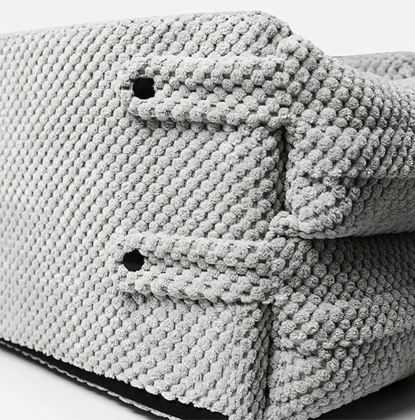 Graues Hundebett aus weichem, strukturiertem Stoff, ideal für Komfort und Stil. Perfekt für Haustiere, langlebig und pflegeleicht.