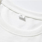 Weißes T-Shirt aus Baumwolle, Größe M, mit Rundhalsausschnitt. Hochwertiges Basic-Kleidungsstück, ideal für lässige Outfits und Alltagsmode.