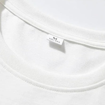 Weißes T-Shirt aus Baumwolle, Größe M, mit Rundhalsausschnitt. Hochwertiges Basic-Kleidungsstück, ideal für lässige Outfits und vielseitige Kombinationen.