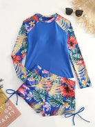 Bunter Badeanzug mit tropischem Blumenmuster, langärmlig, ideal für Strand und Sommer. Perfekt für stilvolle und bequeme Badebekleidung.