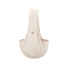Beige Haustier-Reisetasche aus Stoff, ideal für den Winter, mit Schultergurt.