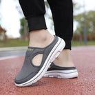 Graue Sportschuhe für Damen, atmungsaktiv und bequem, ideal für Laufen und Freizeit. Modisches Design mit rutschfester Sohle.