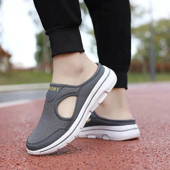 Graue Sportschuhe für Damen, atmungsaktiv und bequem, ideal für Laufen und Freizeit. Modisches Design mit rutschfester Sohle.