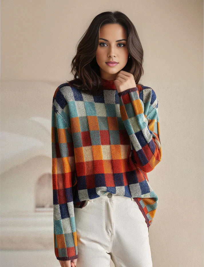 Frau in kariertem Pullover, bunte Herbstmode, lässiger Look, Damenbekleidung, modischer Strick, stilvolle Freizeitkleidung, trendige Outfits.