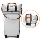 Weißer Hartschalenkoffer mit braunen Griffen und passender Reisetasche, ideal für Reisen.