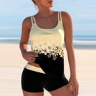 Damen-Tankini mit gelbem Blumenmuster, ideal für Strandmode. Bequeme Passform, stilvolles Design, perfekt für Sommer und Urlaub.