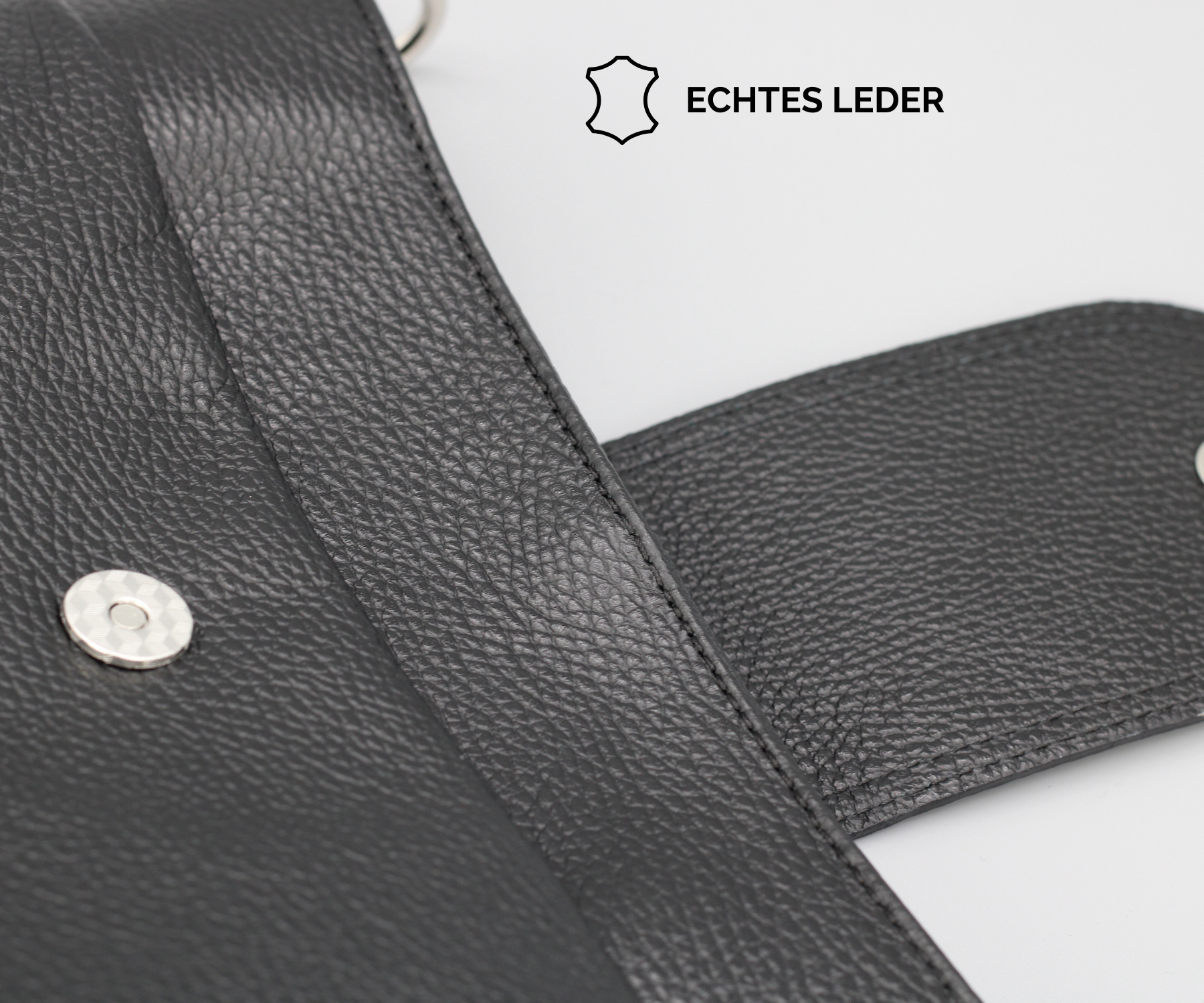 Hochwertige schwarze Ledertasche aus echtem Leder, robust und stilvoll, ideal für den täglichen Gebrauch. Perfekt für Mode- und Lederliebhaber.