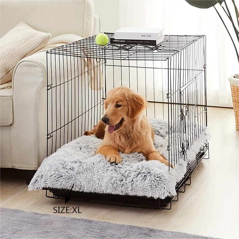Goldener Retriever-Welpe in schwarzem Metall-Hundekäfig mit grauem Plüschkissen, Größe XL.
