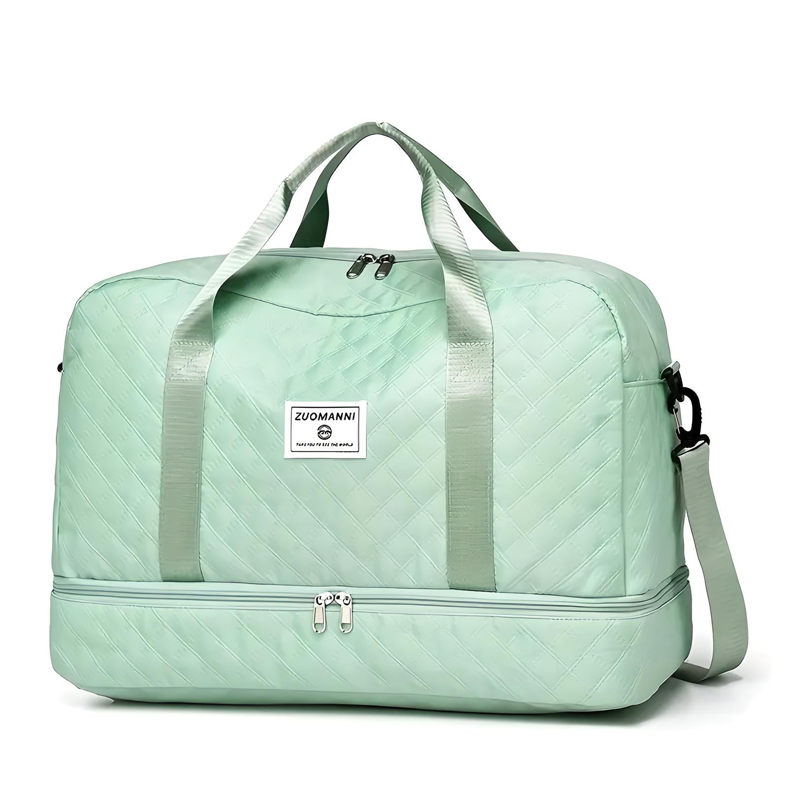 Mintgrüne Reisetasche mit Tragegriffen, Reißverschluss und Schultergurt, ideal für Reisen.