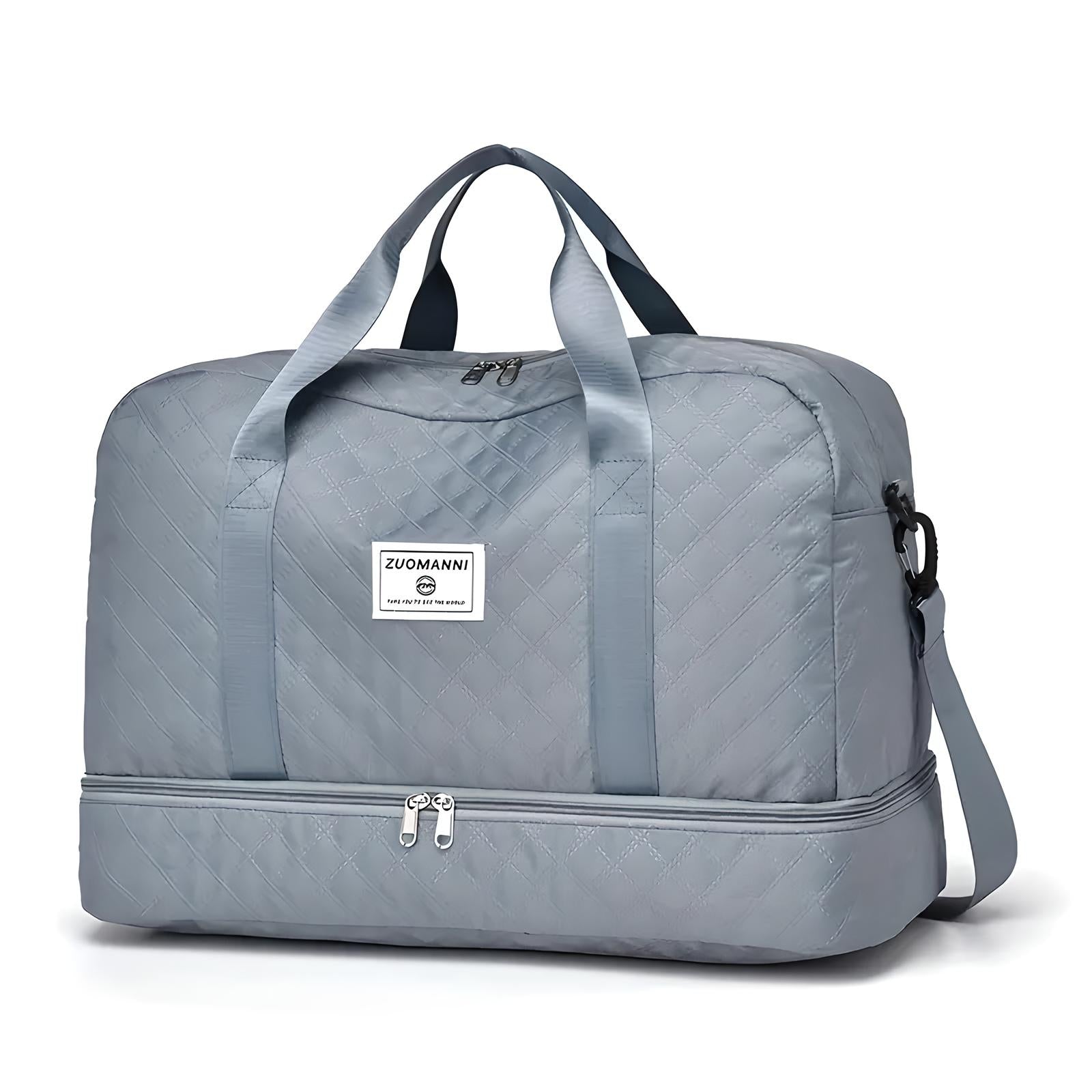 Graue Reisetasche mit Tragegriffen und Schultergurt, geräumig, ideal für Reisen und Sport.