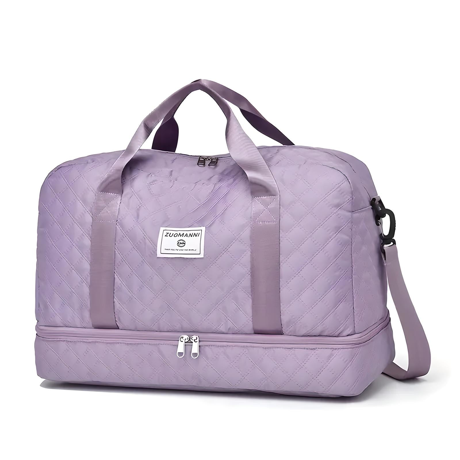 Lila Reisetasche mit Tragegriffen, Reißverschluss, gestepptem Design, ideal für Reisen.