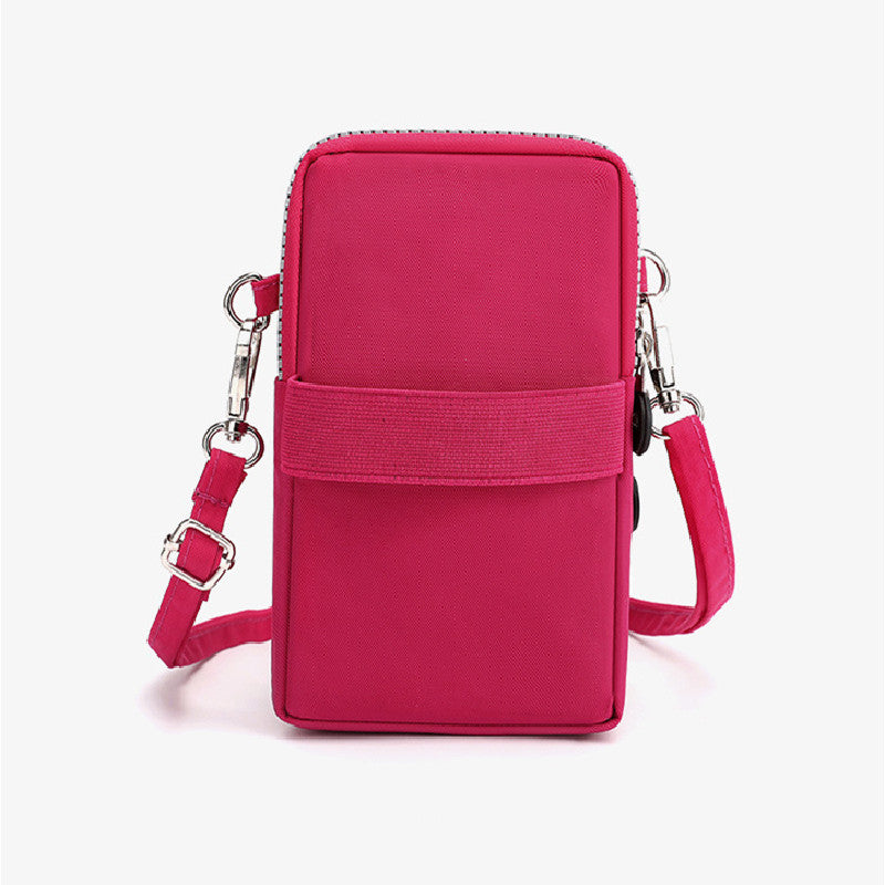 Kompakte, pinke Umhängetasche für Damen, ideal für Smartphones. Modisches Design, verstellbarer Gurt, perfekt für unterwegs und Freizeit.