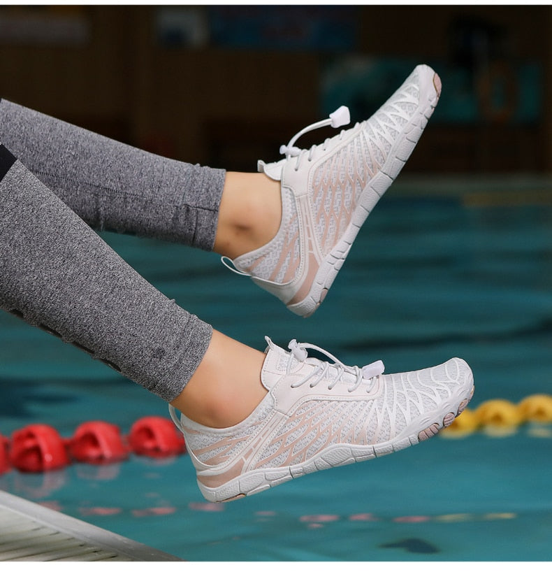Damen-Barfußschuhe, leicht und atmungsaktiv, ideal für Fitness und Wassersport. Perfekte Passform und rutschfeste Sohle für maximalen Komfort.
