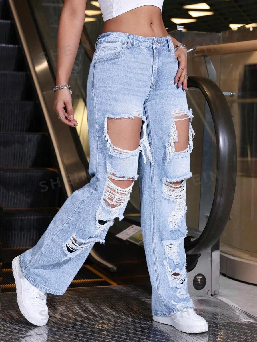 Damen-Jeans mit hohem Bund, zerrissenem Design und weitem Bein. Perfekt für trendige Streetwear-Looks. Ideal für modische Outfits im Alltag.