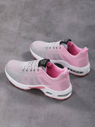 Graue und rosa Damen-Sneaker, atmungsaktiv, mit weißer Sohle, ideal für Sport und Freizeit.