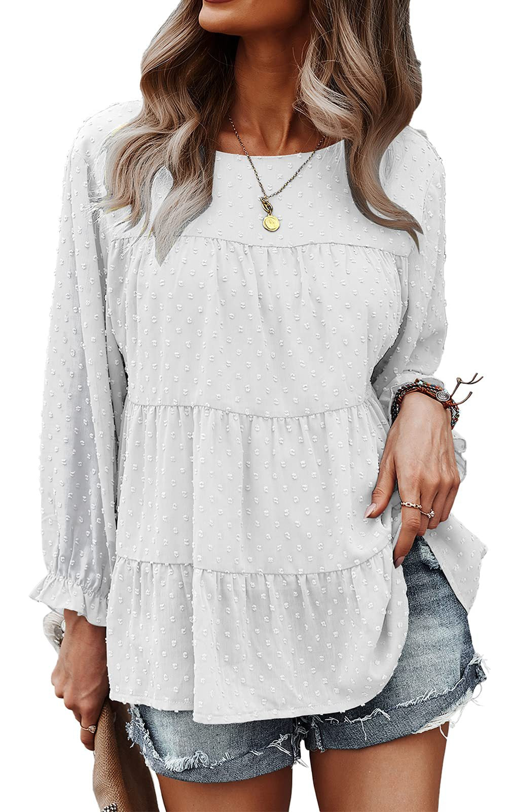 Damenbluse mit langen Ärmeln, weiß, gepunktet, lockerer Schnitt. Perfekt für Sommermode, Freizeitoutfits und lässigen Stil.