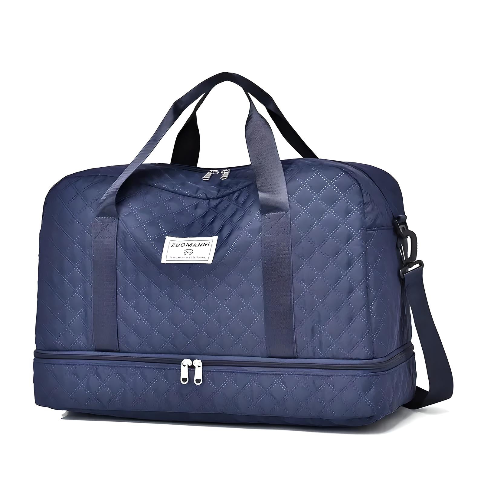 Dunkelblaue Reisetasche mit Tragegriffen und Schultergurt, gestepptes Design, geräumig.