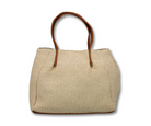 Beige Strohtasche mit braunen Ledergriffen, ideal für Sommer und Strand. Modische Damenhandtasche, geräumig und stilvoll.