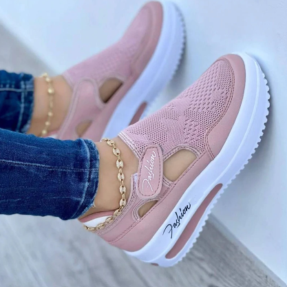 Damen-Sneaker in Rosa mit Keilabsatz, atmungsaktivem Mesh und modischem Design. Perfekt für Freizeit und Sport. Trendige Schuhe für Frauen.