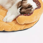 Katzenbett Donut-Form, waschbar, mit Quietschkissen, beige, für Hunde und Katzen.