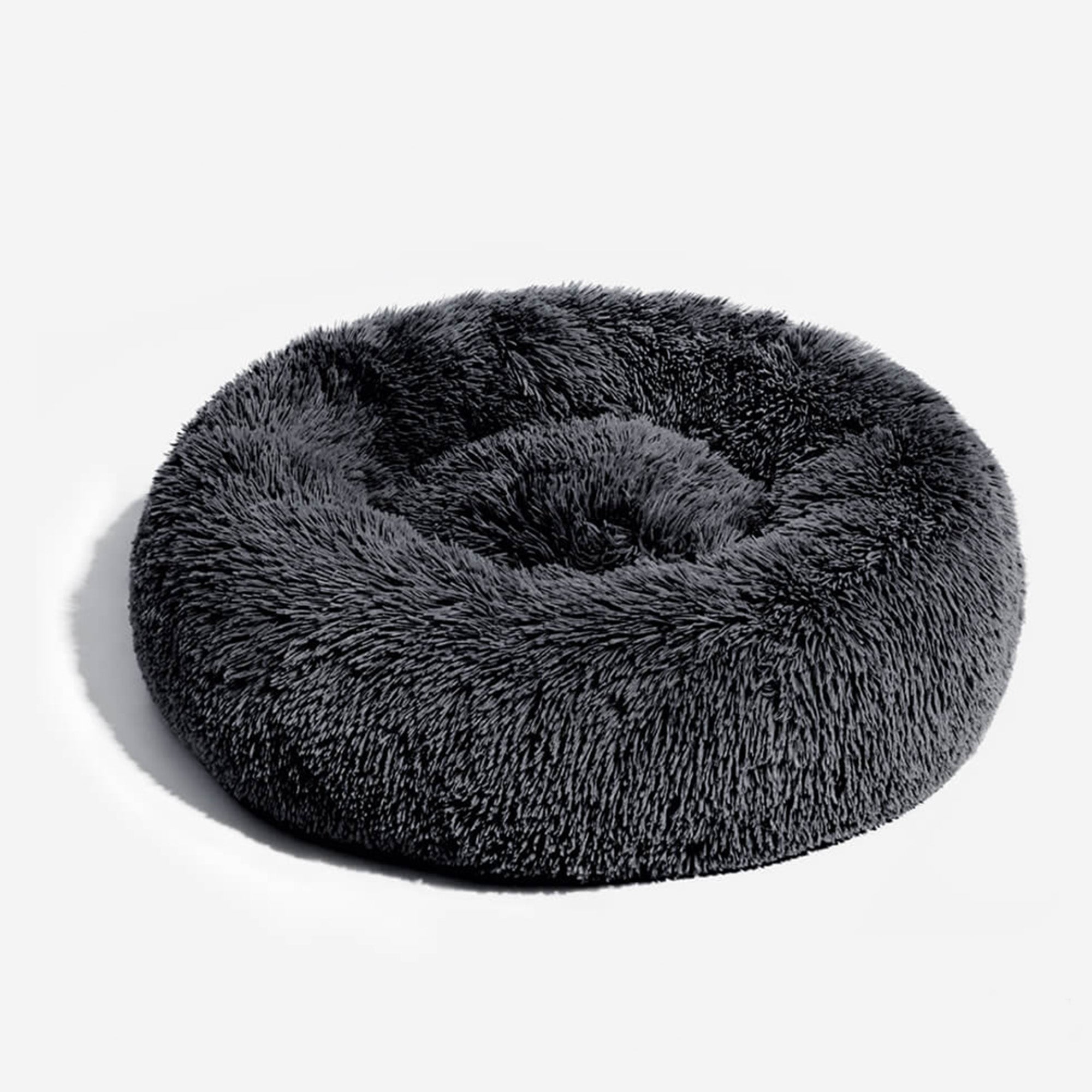 Rundes, flauschiges Hundebett aus grauem Plüsch, gemütlich und weich für Haustiere.