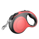 Rote Hundeleine, einziehbar, ergonomischer Griff, robustes Material, für Hundeauslauf.