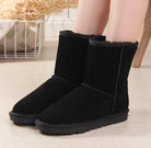 Schwarze Damen-Winterstiefel aus Wildleder mit flauschigem Innenfutter, rutschfeste Sohle. Perfekt für kalte Tage, modisch und bequem.