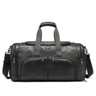 Schwarze Lederreisetasche mit Schultergurt, geräumig, stilvoll, ideal für Reisen und Sport.
