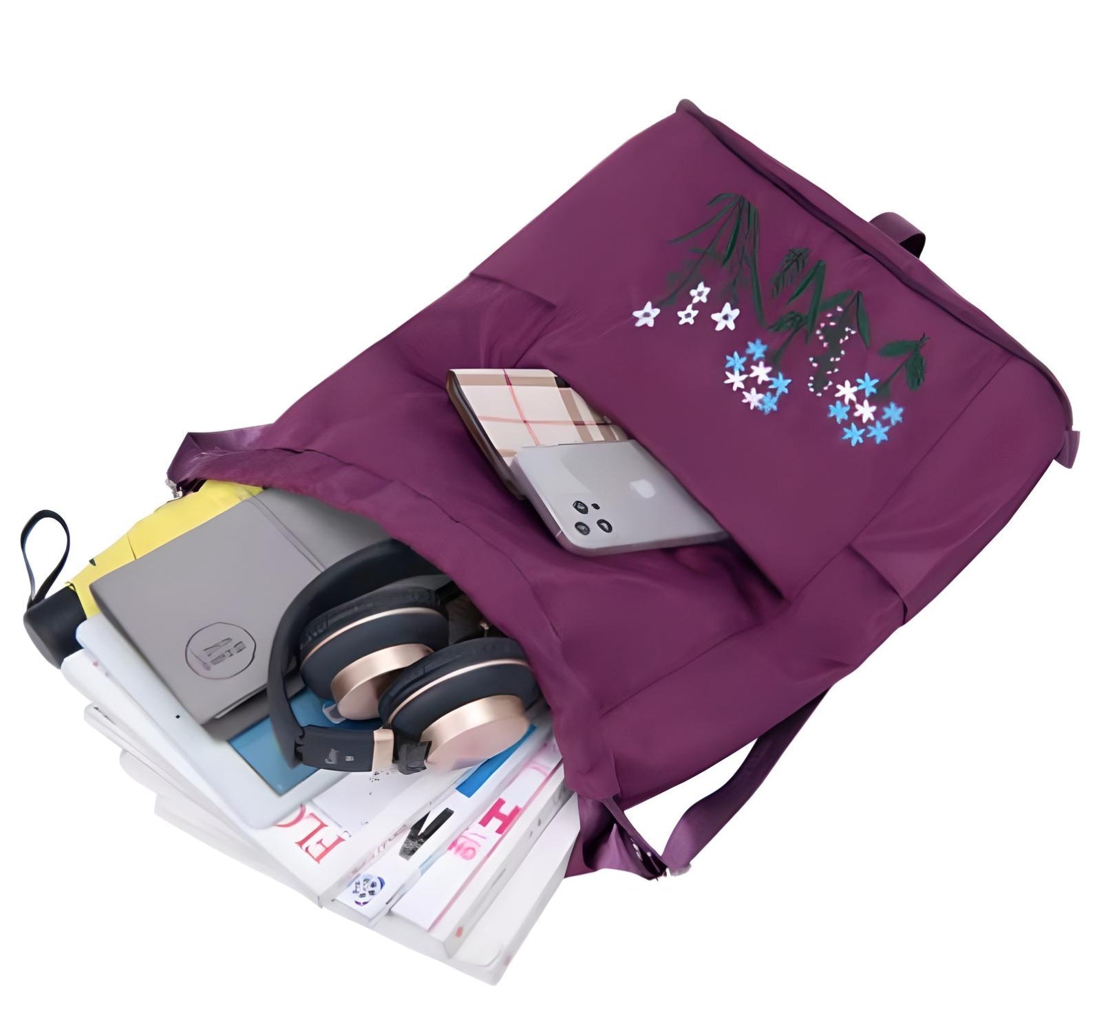 Lila Rucksack mit Blumenstickerei, gefüllt mit Büchern, Kopfhörern und Smartphone.