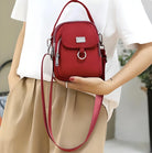 Rote Umhängetasche Damen, Leder, modisch, kompakt, mit Reißverschluss, elegantes Design.