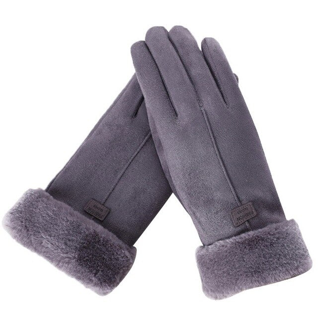 Damen-Winterhandschuhe aus grauem Wildleder mit Kunstfellbesatz, touchscreenfähig, warm und stilvoll. Perfekt für kalte Tage und modische Outfits.