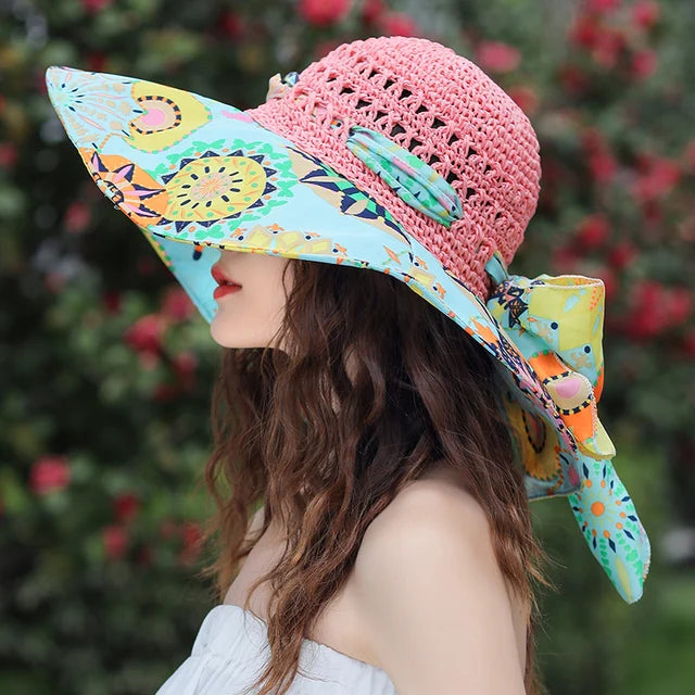 Farbiger Sommer-Strohhut für Damen, ideal für Strand und UV-Schutz. Modischer Eimerhut mit breiter Krempe und buntem Design.