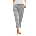 Damenhose aus Baumwolle-Leinen, schwarz, übergroß, elastischer Bund, Taschen, lässiger Stil, ideal für Frühling 2024, bequem und modisch.