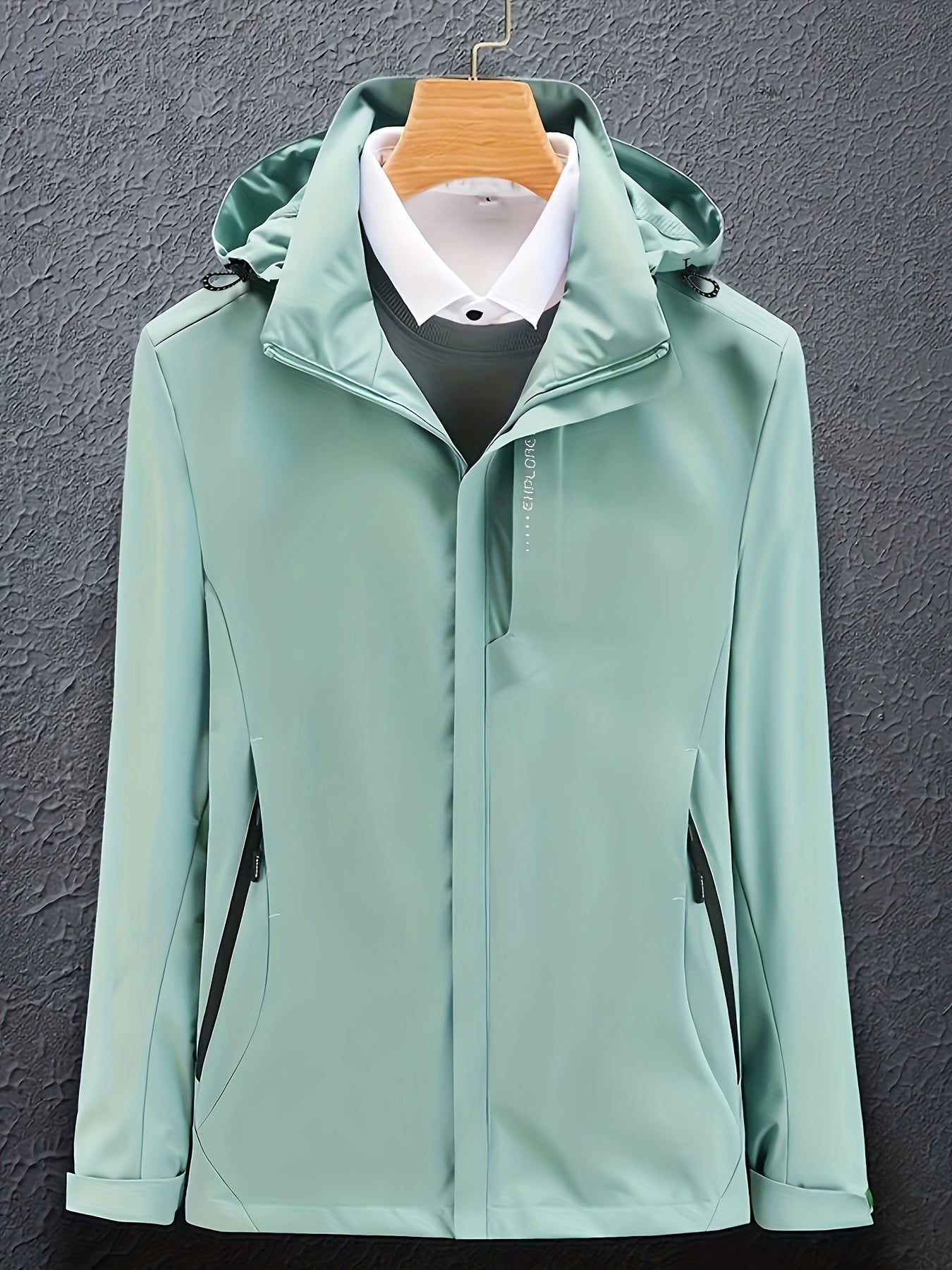 Elegante mintgrüne Herrenjacke mit Kapuze, wasserabweisend, ideal für Outdoor-Aktivitäten. Stilvoller Look, perfekt für Frühling und Herbst.