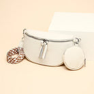Weiße Lederhandtasche mit Reißverschluss, abnehmbarem Schulterriemen und rundem Münzbeutel. Modische Damenaccessoires, elegant und vielseitig.