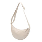 Beige Umhängetasche aus Leder, modisch, Damenaccessoire, elegantes Design, vielseitig einsetzbar.