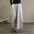 Weite gestreifte Leinenhose für Damen, lässig und bequem, ideal für Frühling und Sommer. Perfekt für modische Freizeitoutfits.