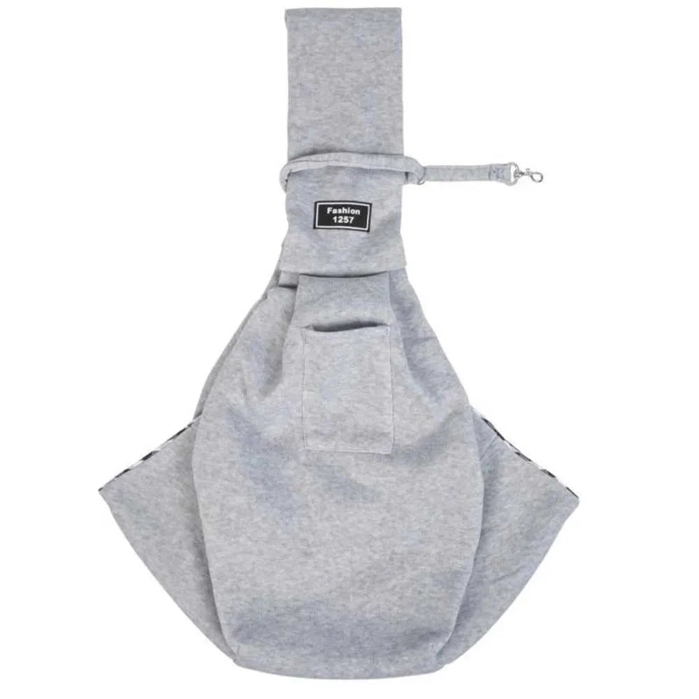 Graue Hundetragetasche aus Stoff, modisch, bequem, mit verstellbarem Gurt, ideal für Reisen.