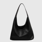 Schwarze Damenhandtasche aus Leder mit Schlangenhaut-Optik, modisch und elegant, ideal für Alltag und Abend, 25 cm groß.