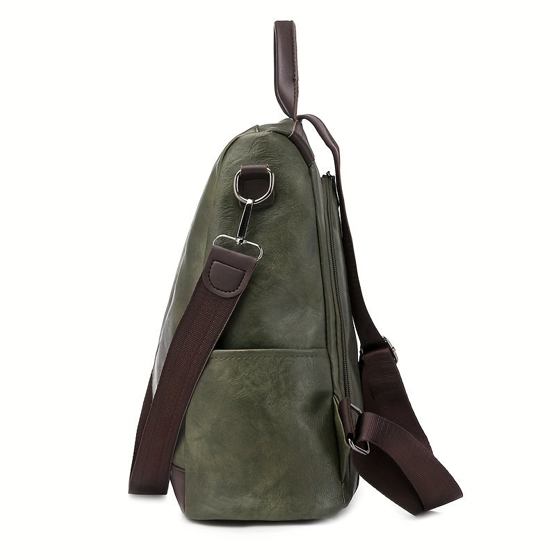 Grüne Ledertasche mit verstellbarem Schultergurt, seitlicher Ansicht. Stilvoll, langlebig, ideal für Reisen und Alltag. Hochwertige Verarbeitung.