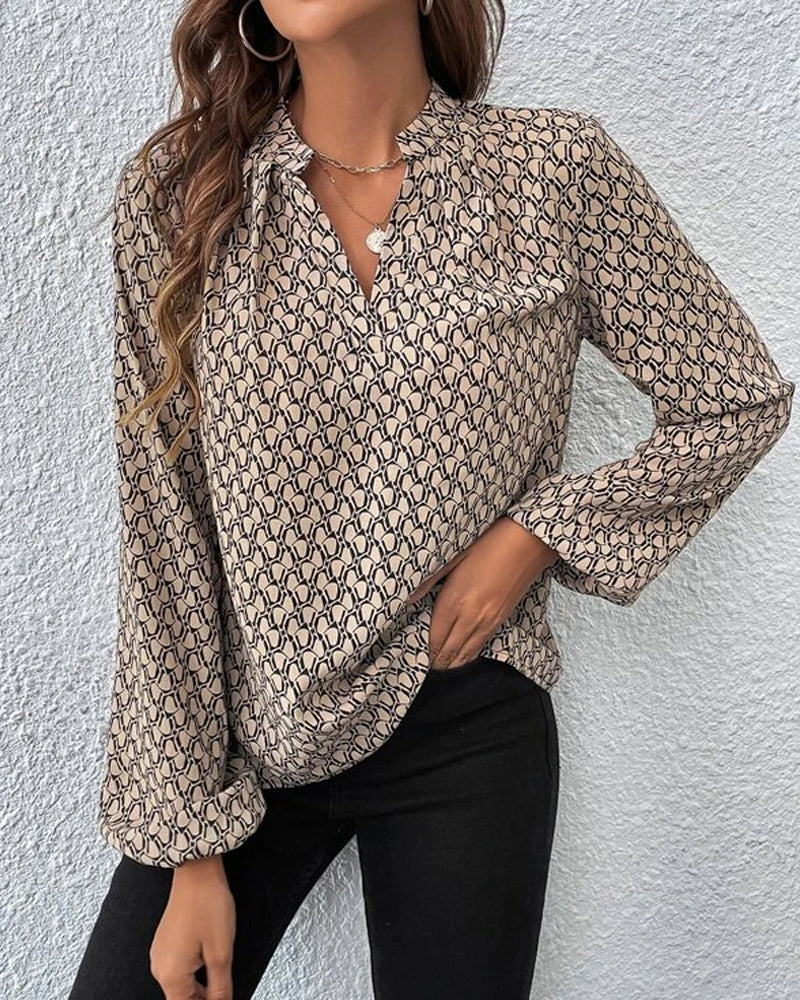 Elegante Damenbluse mit geometrischem Muster, langärmlig, ideal für Büro und Freizeit. Modische Oberbekleidung, vielseitig kombinierbar.