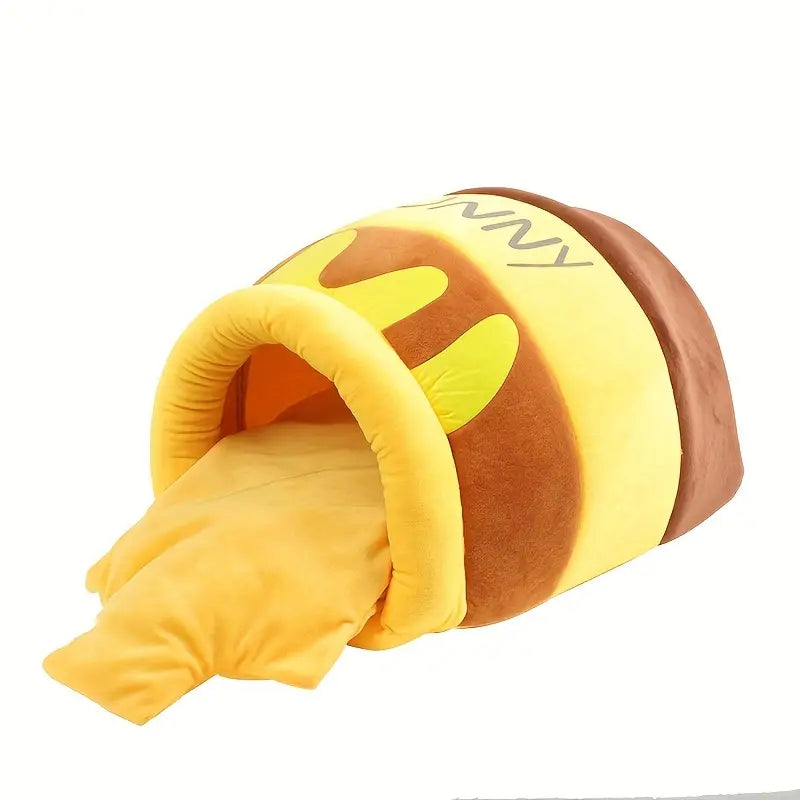 Kuscheliges gelbes Katzennest in Form eines Brötchens, ideal für Haustiere. Weiches Material, gemütliches Design, perfekter Rückzugsort für Katzen.