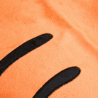 Orangefarbenes Plüsch-Haustierbett mit schwarzen Streifen, weiches Material, gemütlich.