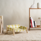 Grün-weiß karierter Haustier-Lounger aus Holz, modern, bequem, stilvolles Design.