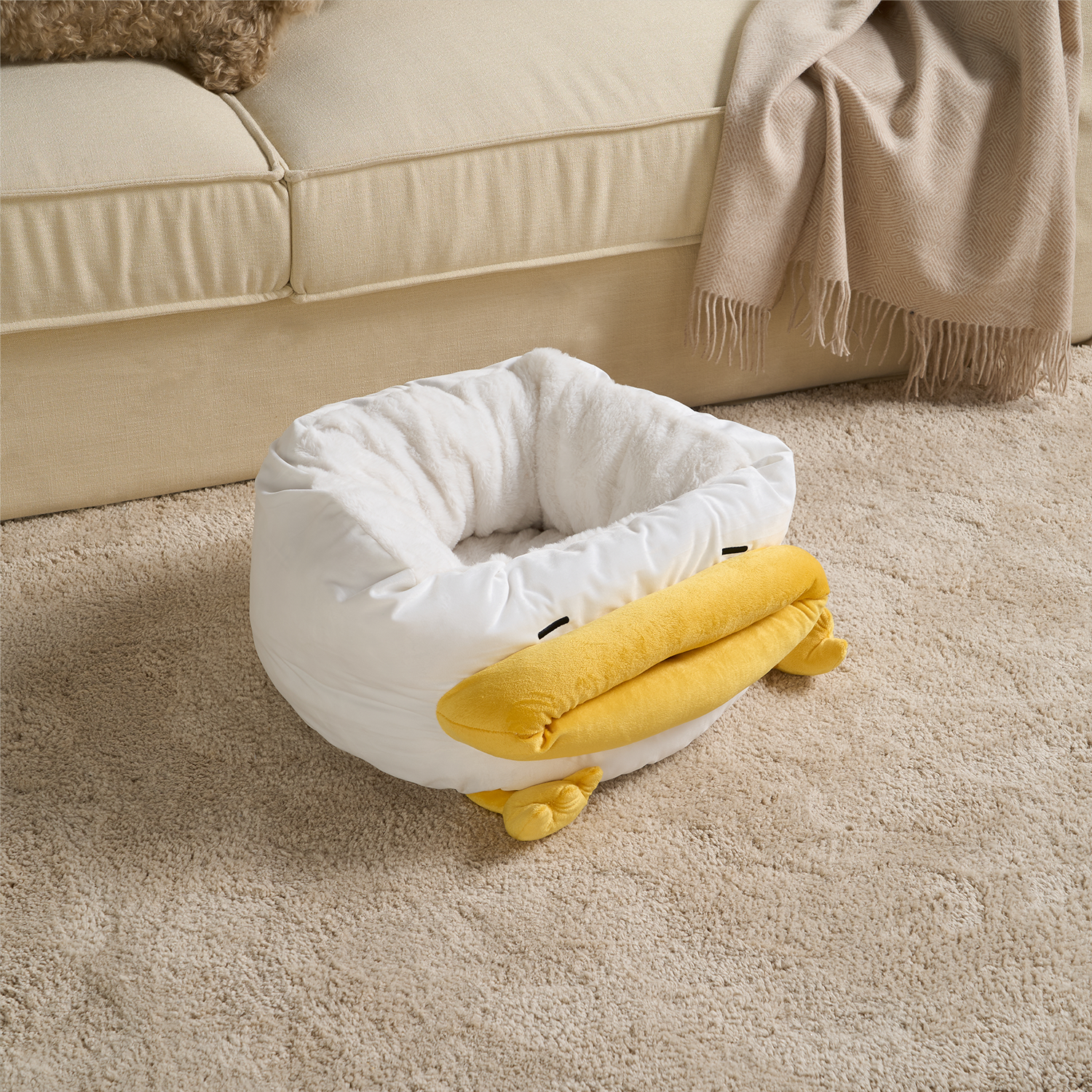 Katzenbett Ente Design, gelb-weiß, flauschig, Fußwärmer, gemütlich, Wohnzimmer, Teppich.