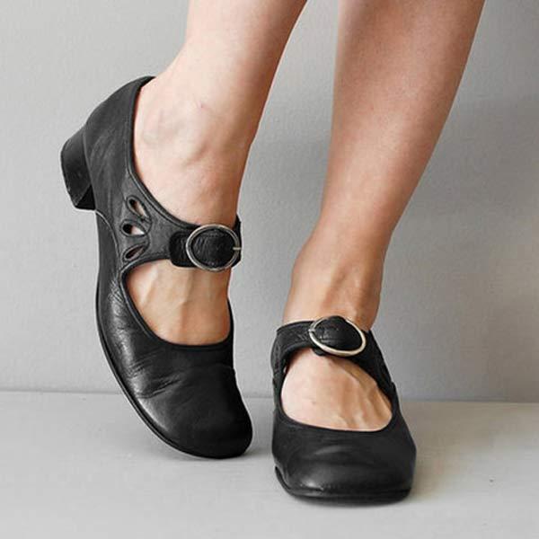 Schwarze Mary Jane Schuhe mit Schnalle, niedriger Absatz, elegantes Design, Damenmode, bequemes Leder, ideal für Alltag und Büro.