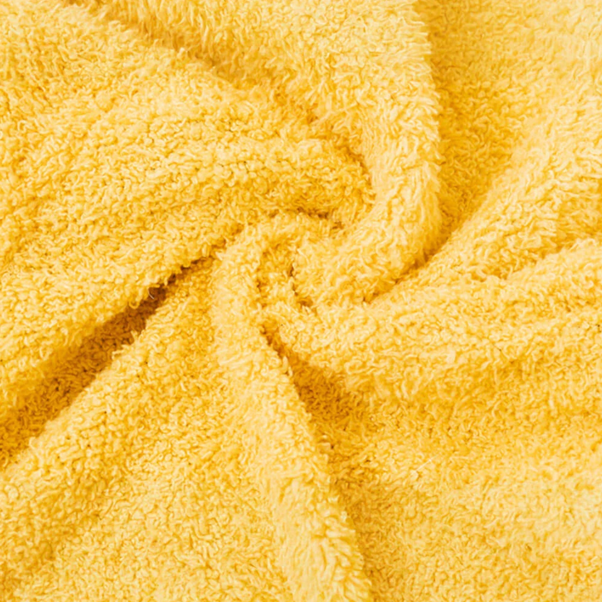 Gelbes, weiches Plüschmaterial, Nahaufnahme, ideal für Haustierbetten, gemütlich und flauschig.