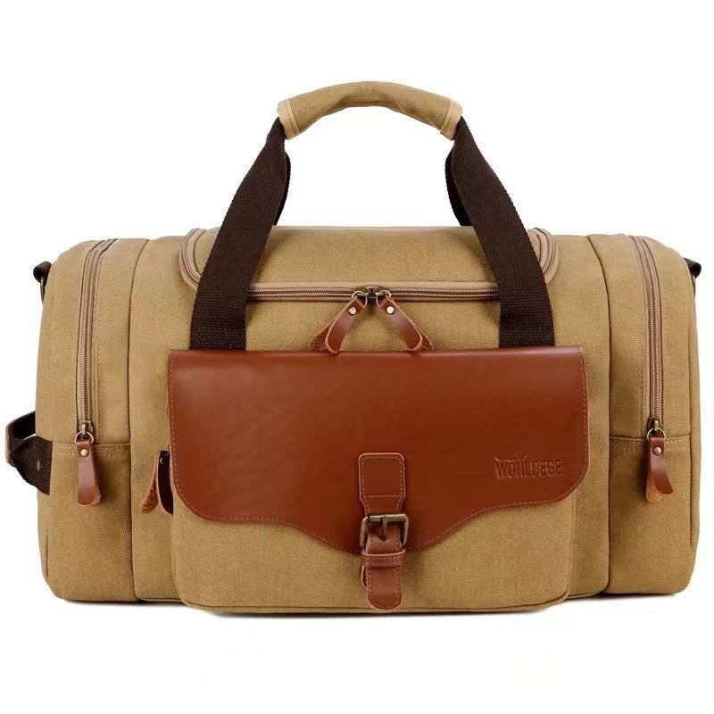 Beige Reisetasche aus Canvas mit braunen Lederakzenten, ideal für Wochenendausflüge.