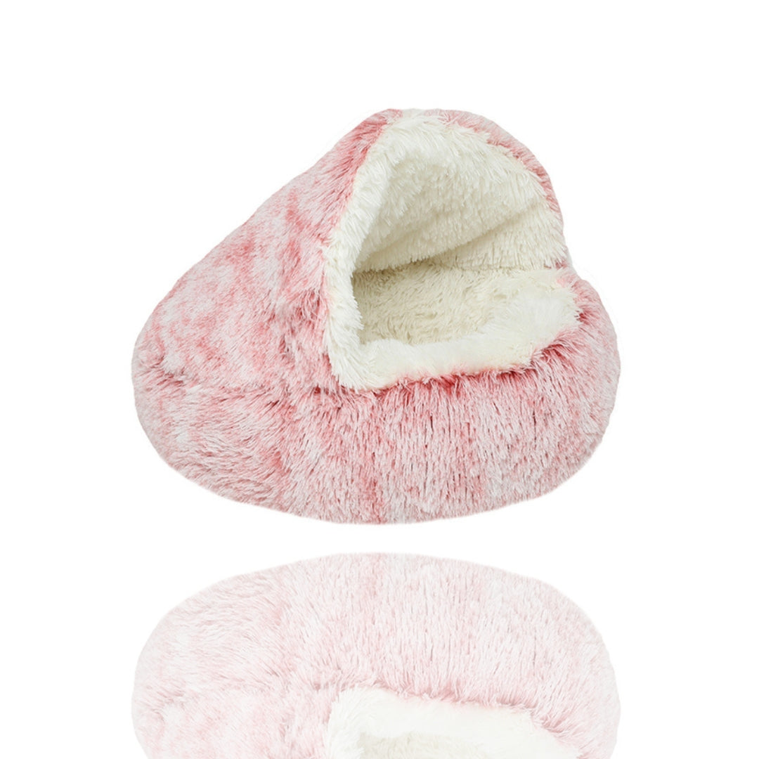 Rosa Katzenhöhle aus weichem Plüsch, gemütlich und warm, idealer Rückzugsort für Katzen. Perfektes Katzenbett für Komfort und Entspannung.
